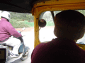 Inside our first rickshaw, speeding terrifyingly through the city