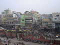 The view outside the mosque. This bazaar area is the place to go if you want car parts - big springs, grubby tyres and any number of other oily components.