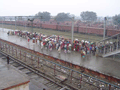 This huge, colourful crowd were huddled together on a chilly morning, waiting for their train to somewhere.