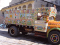The production company, from Bombay, had brought in this gaudy lorry and a nearby camel decorated in a similar vein.