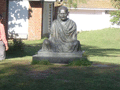 He still sits in the midst of it all, contemplating.