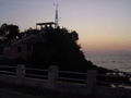The jetty slides into darkness.