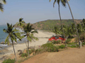 One of the beaches at Vagator. The red shack is painted in the livery of Kingfisher beer, emblazoned with its slogan: 'Maka Naka Cold Drink!' ('Don't want a soft drink!')