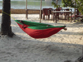 Sleepy Em disappears into a hammock.
