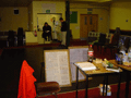 Action continues in the Hall on Monday, the boyz hard at it behind our boards ticking off each and every act of the 185 we performed.